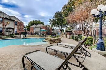 Two sparkling pools with sundeck
